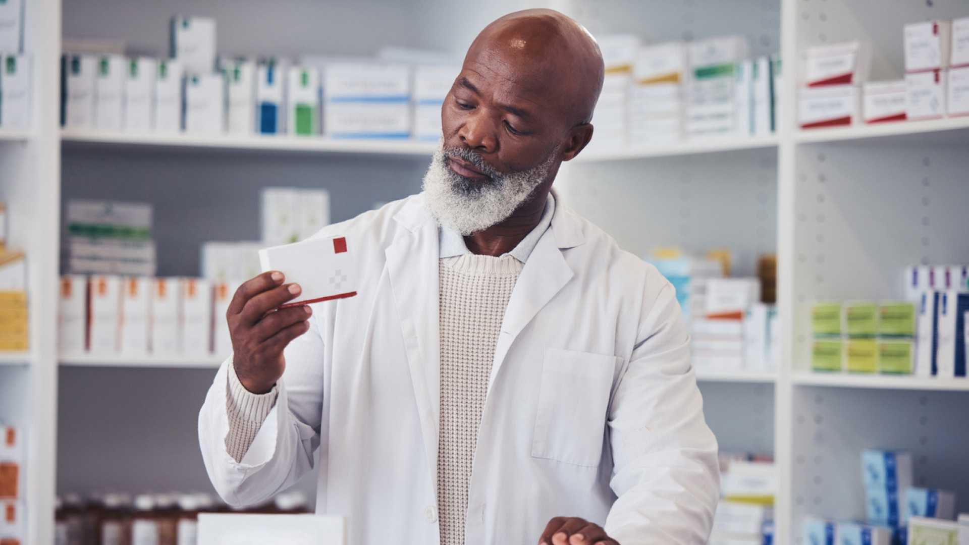 Image of a scientist checking boxes